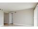 Bright living room with neutral paint, tile floors, and an open doorway at 408 S Edgemon Ave, Winter Springs, FL 32708