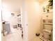 Well-lit bathroom with neutral tones, decorative shower curtain, and vanity sink at 3017 Country Club Cir, Winter Haven, FL 33881