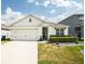 Charming single-story home with a well-maintained lawn and inviting curb appeal at 3017 Country Club Cir, Winter Haven, FL 33881