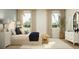 Bright bedroom with large windows, comfortable bed, woven bench and serene ambiance at 757 Terrapin Dr, Debary, FL 32713