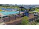Community recreation center featuring pool, lake, playground, and green space at 757 Terrapin Dr, Debary, FL 32713