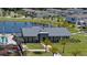 Community recreation center featuring pool, lake, green space and playground at 757 Terrapin Dr, Debary, FL 32713