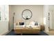 Cozy living room with a comfortable sofa, modern decor, and a large window at 757 Terrapin Dr, Debary, FL 32713