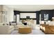 Open-concept living space with a comfortable sofa, stylish furnishings, and modern décor accents at 757 Terrapin Dr, Debary, FL 32713