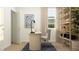 Well-lit home office with a unique desk, comfortable chair, and ample storage space at 757 Terrapin Dr, Debary, FL 32713