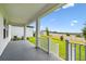 Covered back patio offering outdoor living space with a view of the backyard at 16994 Cedar Valley Cir, Clermont, FL 34711