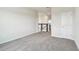 Carpeted bedroom with closet and entry door at 16994 Cedar Valley Cir, Clermont, FL 34711