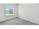 Cozy bedroom features a window with a view of the neighborhood at 16994 Cedar Valley Cir, Clermont, FL 34711