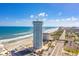 Beachfront condo building with ocean views and modern architecture, offering an upscale coastal lifestyle at 2625 S Atlantic Ave # 24Sw, Daytona Beach, FL 32118