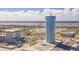 Luxury beachfront condo building with tennis courts and pool, offering panoramic ocean and river views at 2625 S Atlantic Ave # 24Sw, Daytona Beach, FL 32118