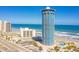 Aerial view of beachfront condo building, offering luxurious amenities and breathtaking ocean views at 2625 S Atlantic Ave # 24Sw, Daytona Beach, FL 32118