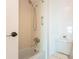 A classic bathroom features a shower-tub combo with a white toilet and neutral finishes at 2625 S Atlantic Ave # 24Sw, Daytona Beach, FL 32118