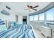 Light-filled bedroom with twin beds and ocean views at 2625 S Atlantic Ave # 24Sw, Daytona Beach, FL 32118