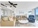 Cozy living room features neutral colors and comfortable seating and natural light at 2625 S Atlantic Ave # 24Sw, Daytona Beach, FL 32118