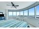 Large main bedroom with floor-to-ceiling windows providing spectacular city views at 2625 S Atlantic Ave # 24Sw, Daytona Beach, FL 32118