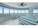 Bright main bedroom with panoramic ocean view, coastal furnishings, and access to a private balcony at 2625 S Atlantic Ave # 24Sw, Daytona Beach, FL 32118