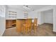 Basement bar area featuring custom wood bar, seating, and under-cabinet storage at 2425 Anderson, Mulberry, FL 33860