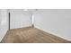 Bedroom with neutral carpet, white walls, ceiling fan and sliding closet doors at 2425 Anderson, Mulberry, FL 33860