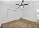 Cozy bedroom with neutral carpeting, a ceiling fan and access to an ensuite bathroom at 2425 Anderson, Mulberry, FL 33860