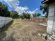 Spacious backyard with partial fencing; lots of potential for outdoor living at 2610 Tennessee Rd, Lakeland, FL 33815