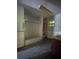 Bathroom featuring shower-tub, stained glass window, and outdated fixtures; renovation needed at 2610 Tennessee Rd, Lakeland, FL 33815