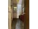 Bathroom featuring colorful stained glass window and outdated fixtures; renovation needed at 2610 Tennessee Rd, Lakeland, FL 33815