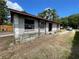 Single-story home with a spacious front yard and solid construction at 2610 Tennessee Rd, Lakeland, FL 33815