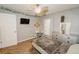 Bright bedroom showcasing neutral walls, plush carpet, and a cozy sleeping space at 1808 Ashton E Dr, St Cloud, FL 34771