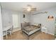 Bedroom featuring simple décor, desk with chair, and ample natural light at 1808 Ashton E Dr, St Cloud, FL 34771