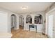 Casual dining area featuring archways into the living room, and neutral wall paint throughout the space at 1808 Ashton E Dr, St Cloud, FL 34771