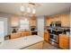 Well-lit kitchen with stainless steel appliances, cabinets, and a center island at 1808 Ashton E Dr, St Cloud, FL 34771