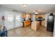 Spacious kitchen with stainless steel appliances, island, and plenty of cabinet space at 1808 Ashton E Dr, St Cloud, FL 34771