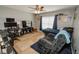 Spacious living room featuring neutral walls, tile flooring, and a comfortable seating area at 1808 Ashton E Dr, St Cloud, FL 34771