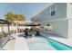 Inviting backyard pool with a seating area, perfect for relaxation and entertainment at 1808 Ashton E Dr, St Cloud, FL 34771