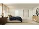 Cozy bedroom featuring a comfortable bed, matching nightstands, and ample light, creating a relaxing personal retreat at 2109 Lasso Loop, Eagle Lake, FL 33839