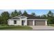 Beautiful single-story home featuring a three-car garage, well-manicured lawn, and neutral-toned exterior at 2109 Lasso Loop, Eagle Lake, FL 33839