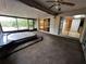 Spacious enclosed porch with view of the backyard at 3050 Carolina Ave, Lakeland, FL 33803
