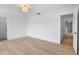 Bright bedroom featuring a ceiling light and vinyl flooring at 1322 Aguacate Ct, Orlando, FL 32837