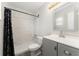 Bathroom with white tile shower, modern vanity, and updated fixtures at 14464 Sw 34Th Terrace Rd, Ocala, FL 34473