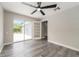 Bedroom with sliding door access to patio at 14464 Sw 34Th Terrace Rd, Ocala, FL 34473