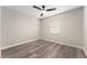 Bedroom with a ceiling fan and a window at 14464 Sw 34Th Terrace Rd, Ocala, FL 34473