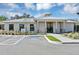 Well landscaped community fitness center with accessible parking and covered entry at 2437 Spring Tune Aly, Kissimmee, FL 34744