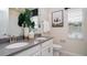 Modern bathroom with double vanity, neutral tones and stylish decor at 2507 Peace Of Mind Ave, Kissimmee, FL 34744