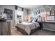 Stylish bedroom with baseball theme, accent wall and natural light at 2507 Peace Of Mind Ave, Kissimmee, FL 34744