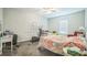 Bedroom with a unique window and exercise equipment at 3184 Whispering Trails Ave, Winter Haven, FL 33884