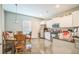 Bright kitchen features stainless steel appliances and white cabinetry at 3184 Whispering Trails Ave, Winter Haven, FL 33884