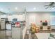 Modern kitchen featuring stainless steel appliances, white cabinetry, and an open layout at 3184 Whispering Trails Ave, Winter Haven, FL 33884