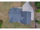 A bird's-eye view of a well-maintained home with a dark roof and spacious yard at 4004 Se 47Th Pl, Ocala, FL 34480