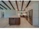 Gourmet kitchen with white cabinetry, stainless steel appliances, and an island, perfect for entertaining at 4004 Se 47Th Pl, Ocala, FL 34480