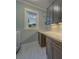 Laundry room with washer and dryer, painted cabinets and luxury countertops at 4004 Se 47Th Pl, Ocala, FL 34480